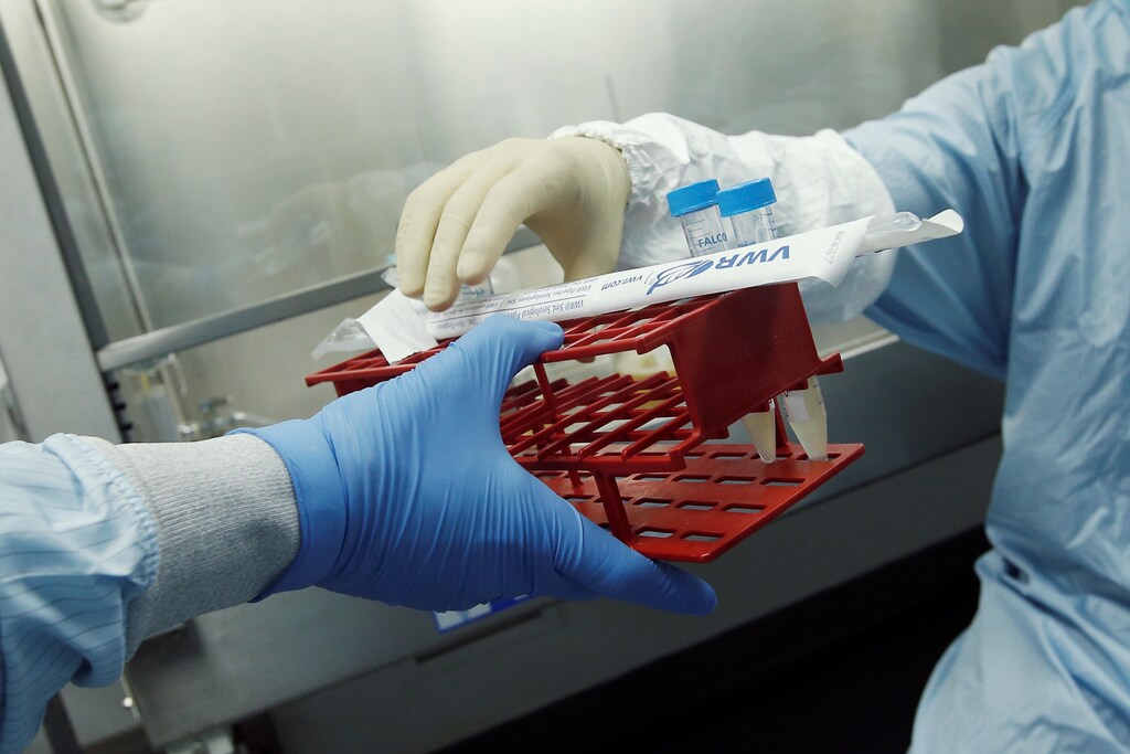 Manufacturing Associates Theodore Szmurlo (L) and David Artus work in a cell culture room where they are working on developing a vaccine for the Zika virus based on production of recombinant variations of the E protein from the Zika virus at the Protein Sciences Inc. headquarters in Meriden, Connecticut, U.S., June 20, 2016.