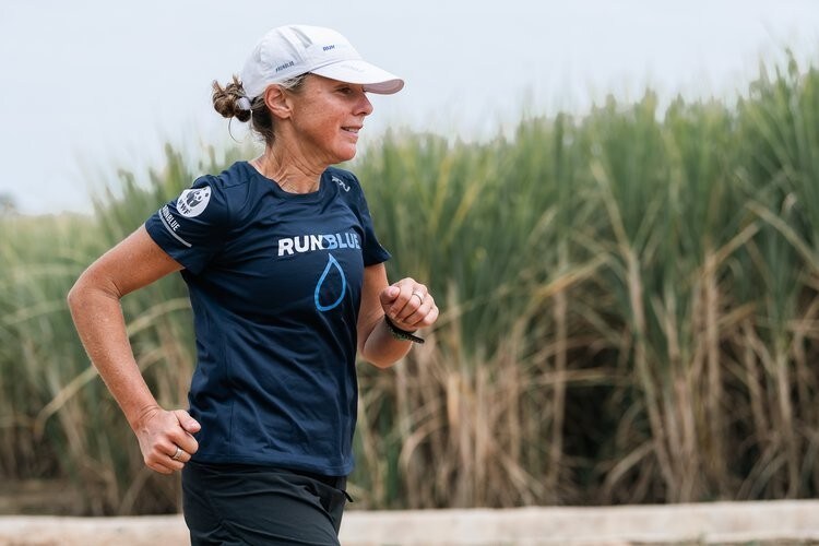 Mina Guli, founder and CEO of Thirst Foundation, running marathon no. 58 of 200 in Zambia.