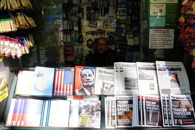 A news stand outfitted with "Fake News" headlines for a stunt pulled off by the Columbia Journalism Review is pictured in the Manhattan borough of New York, New York, U.S., October 30, 2018. REUTERS/Carlo Allegri - RC1219EFF020