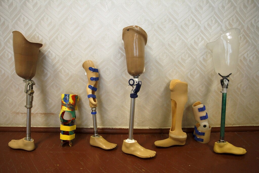 Prosthetic legs are displayed at the Orthopedic Center in Donetsk, Ukraine, December 2, 2015. REUTERS/Alexander Ermochenko - GF20000082432