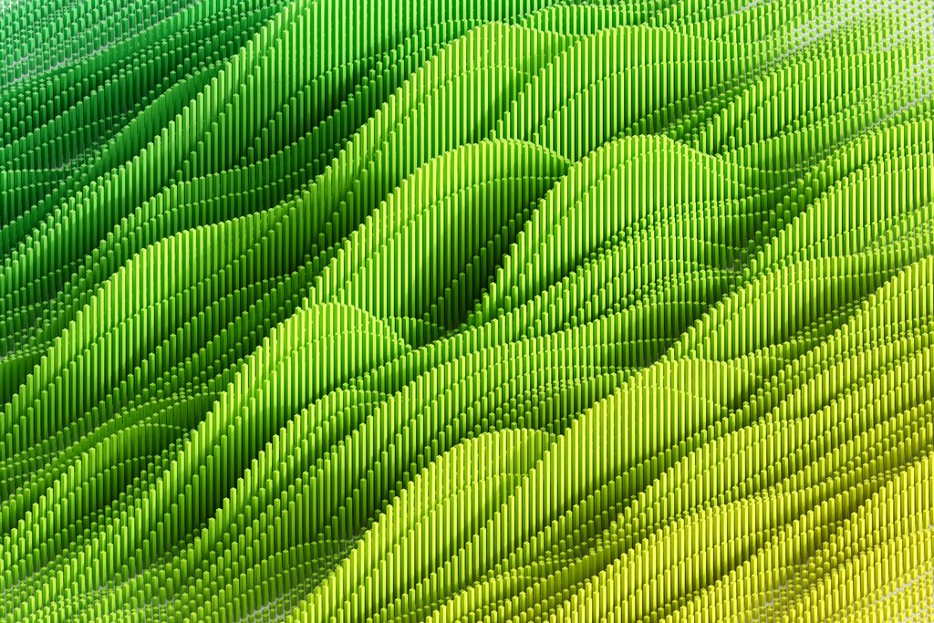 Digitally generated image of multi coloured vertical bars. Concept of fintech technology, new banking and responsible business: The green economy is projected to grow to $7 trillion by 2030