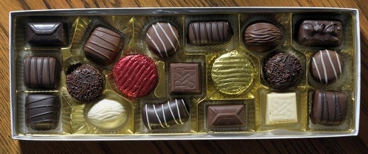 A ten dollar box of Russell Stover's "Premium Collection" candies are shown in Kansas City, Kansas July 14, 2014. Switzerland's Lindt & Spruengli has agreed to buy U.S. candy maker Russell Stover in a billion-dollar deal that makes it the third-biggest chocolate maker in the United States behind Hershey and Mars. REUTERS/Dave Kaup (UNITED STATES - Tags: BUSINESS FOOD)