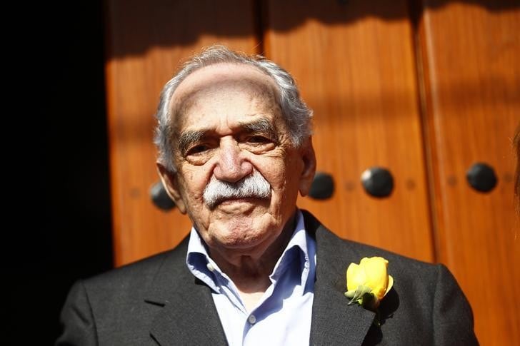 Colombian author Gabriel Garcia Marquez stands outside his house on his 87th birthday in Mexico City March 6, 2014.     