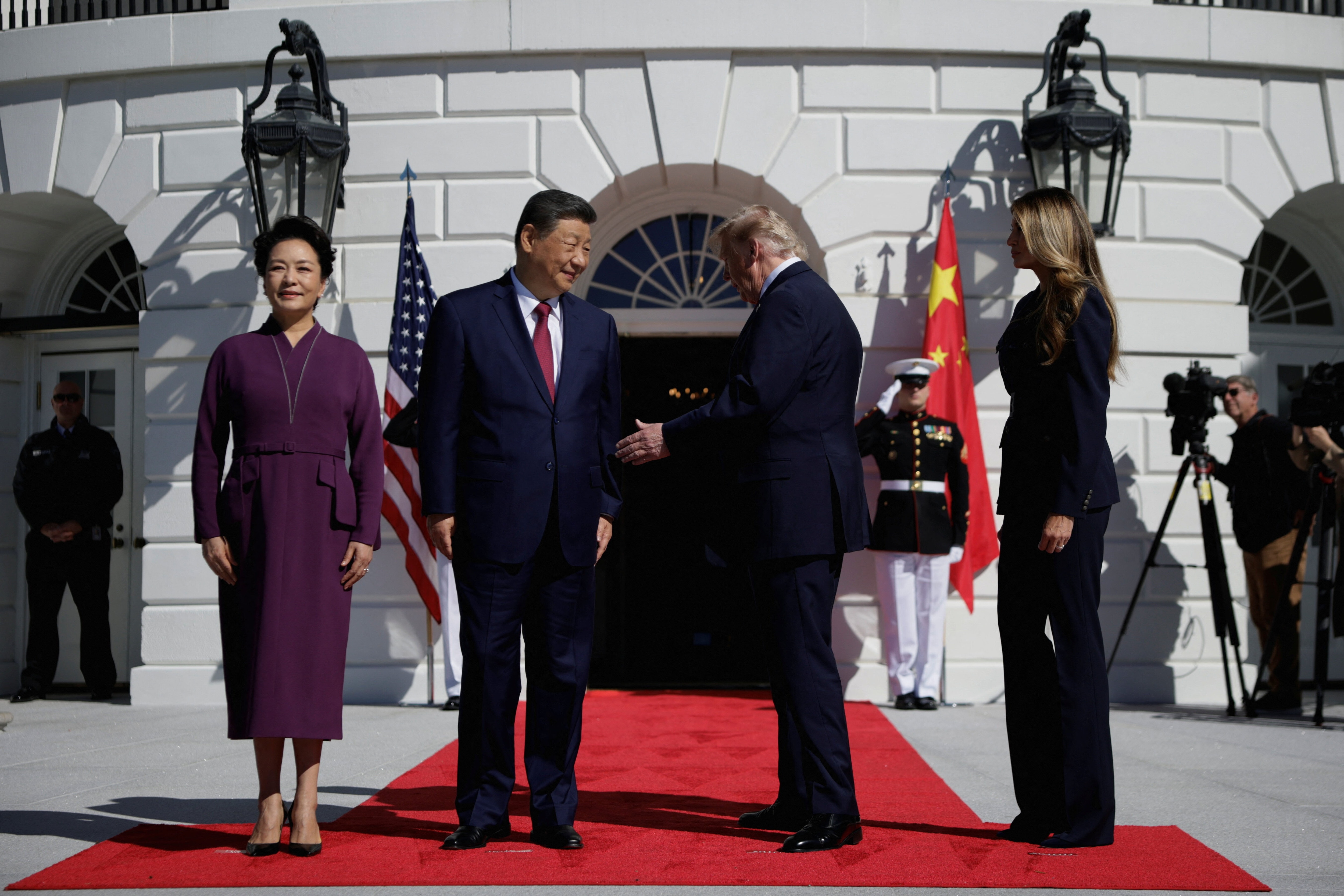 US President Donald Trump and first lady Melania Trump greet Chinese President Xi Jinping and his wife Peng Liyuan at the White House in Washington, DC, US, September 25, 2026. REUTERS/Evan Vucci