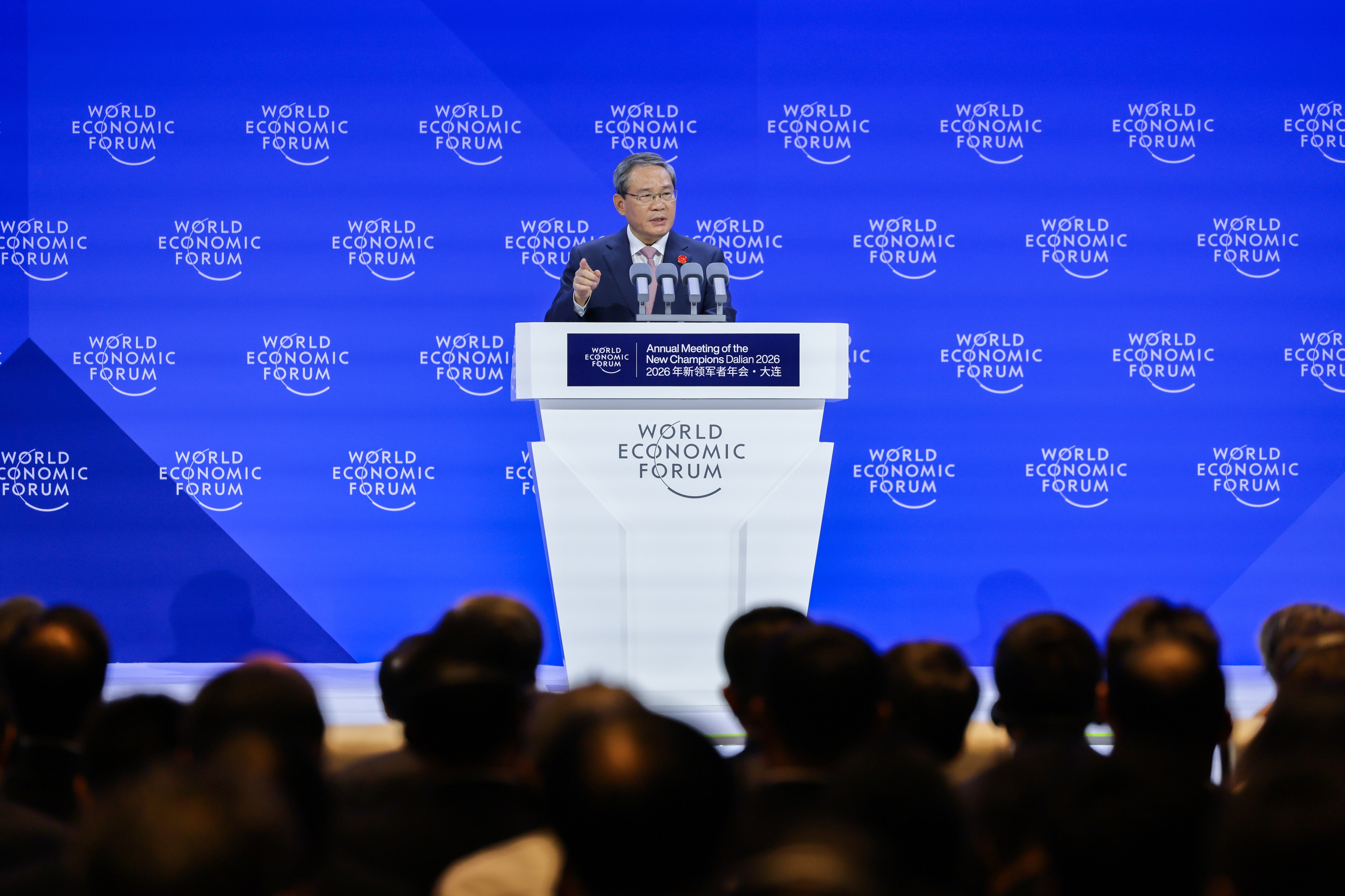 Opening Plenary session with Alois Zwinggi, President and CEO, World Economic Forum; Gim Huay Neo, Managing Director, World Economic Forum; Li Qiang, Premier of the People's Republic of China; Wang Xinwei, Governor, People's Government of Liaoning Province, People's Republic of China during the Annual Meeting of the New Champions in Dalian, People's Republic of China, on 24/6/2026 from 10:00 to 10:45 in the Dalian International Conference Center - Plenary Hall (Zone C), Opening. (opening). Â©2026 World Economic Forum
