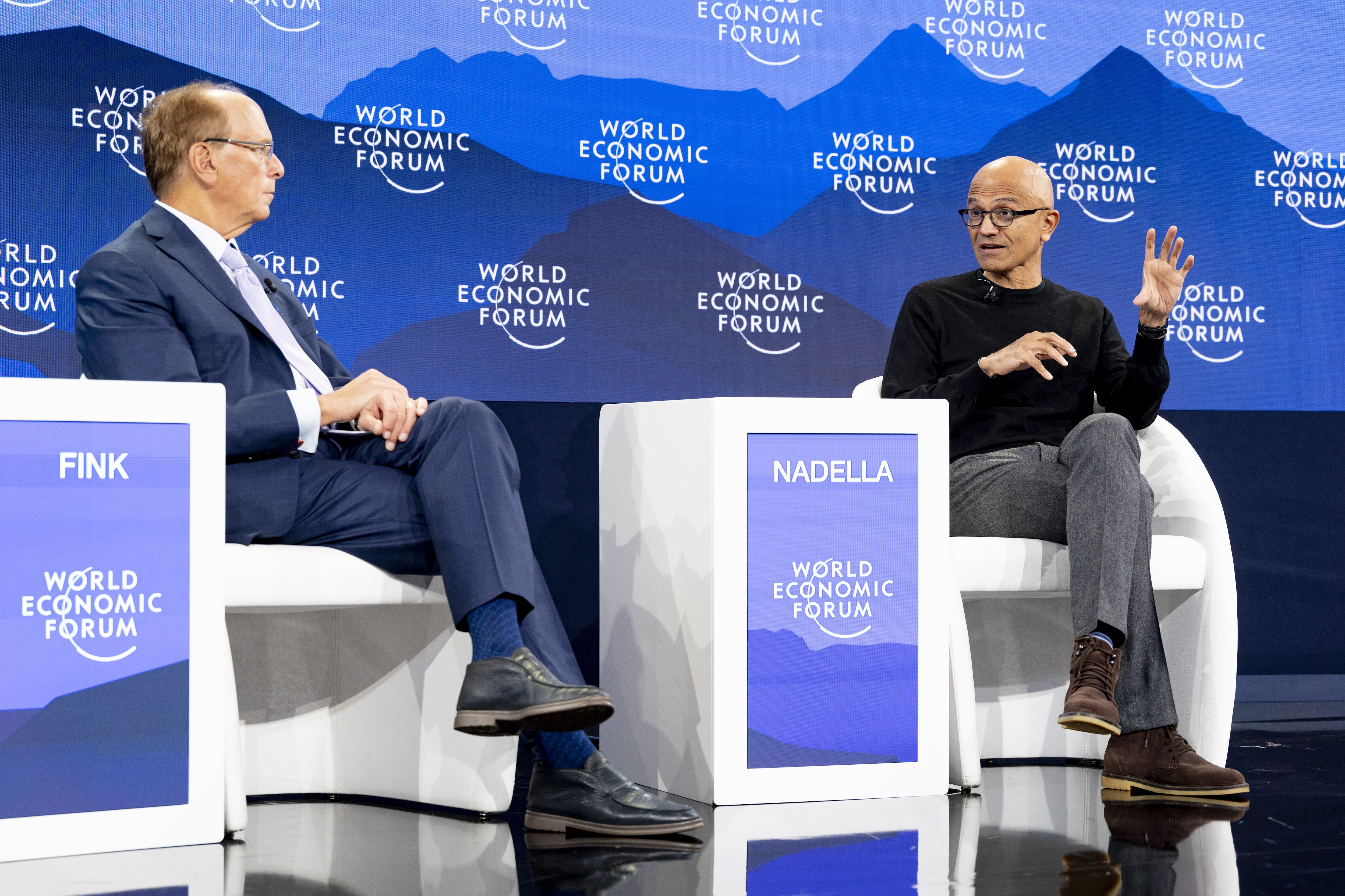 Larry Fink, Chair and CEO of BlackRock and Interim Co-Chair of the World Economic Forum, speaks with Microsoft Chairman and CEO Satya Nadella.