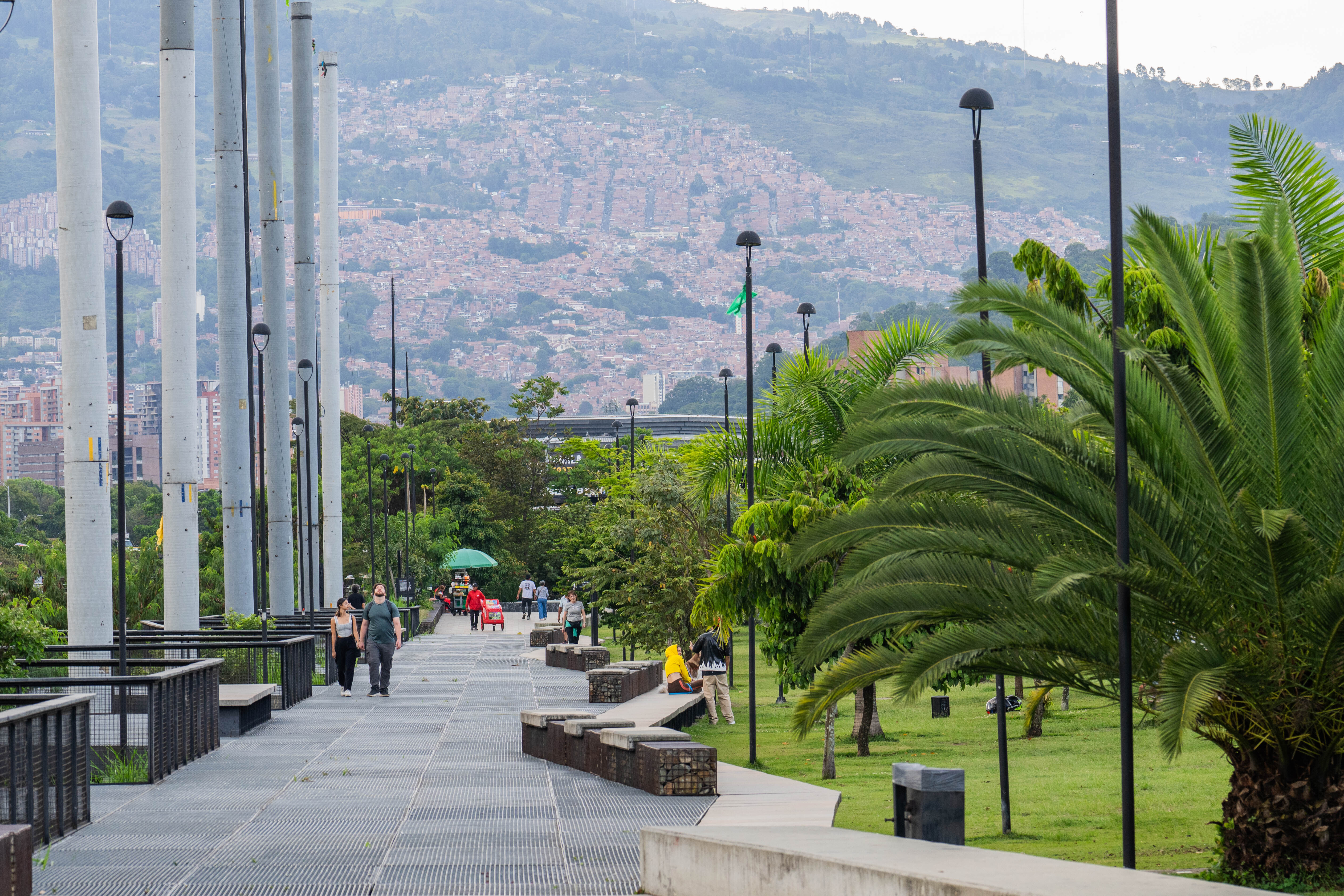Tree-lined public space along Medellín’s Parque del Río, a project reconnecting residents to the river