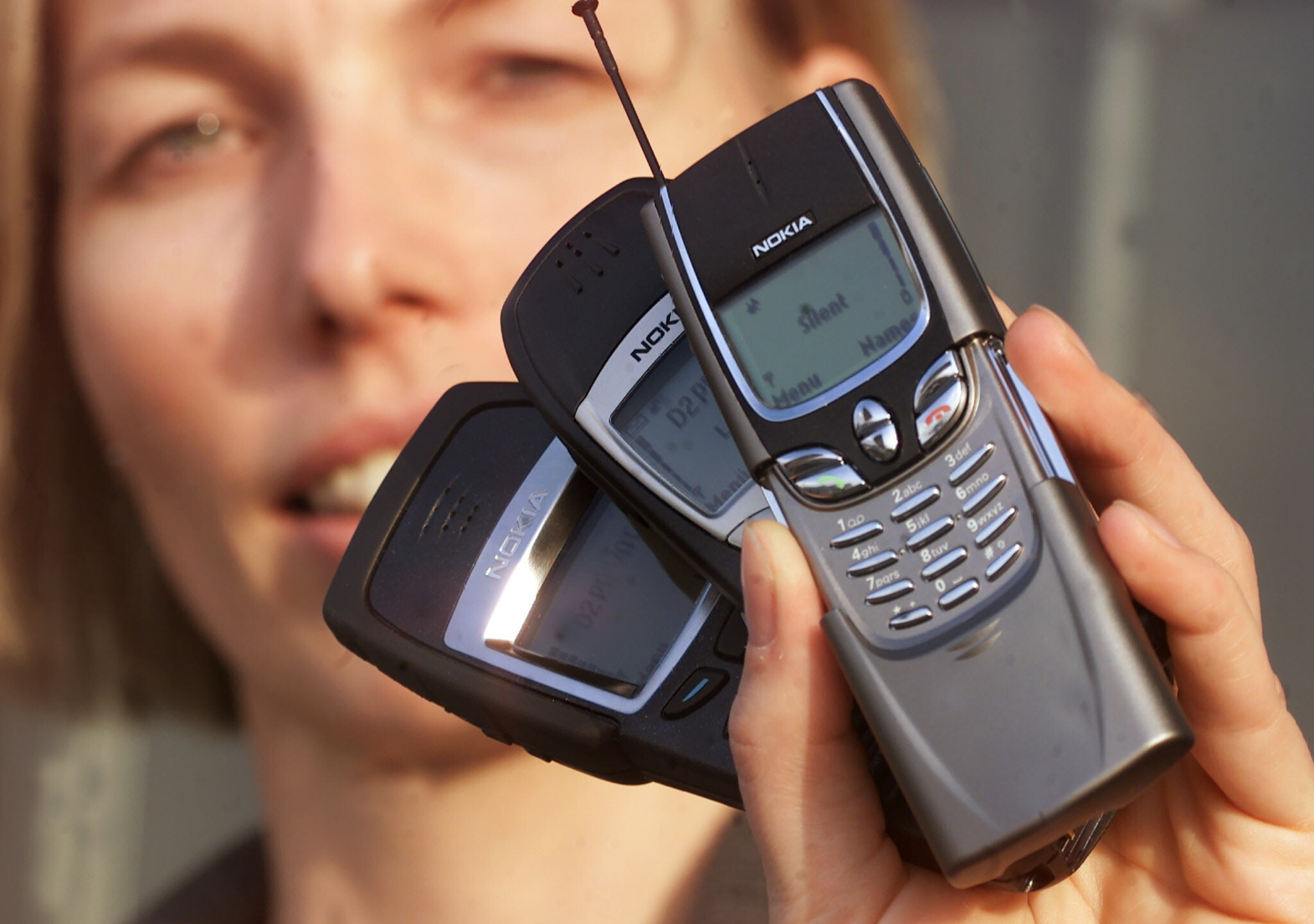 A model displays Nokia's new mobile phones, the 6250, a shock resistant and waterproof phone, the so called 