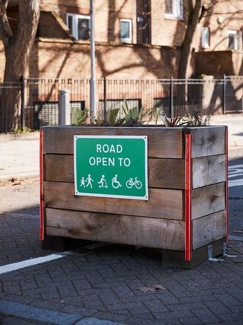 a picture of a road block sign 