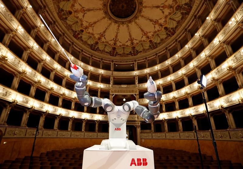 Humanoid robot YuMi is seen during the rehearsal at the Verdi Theatre in Pisa, Italy September 12, 2017.     