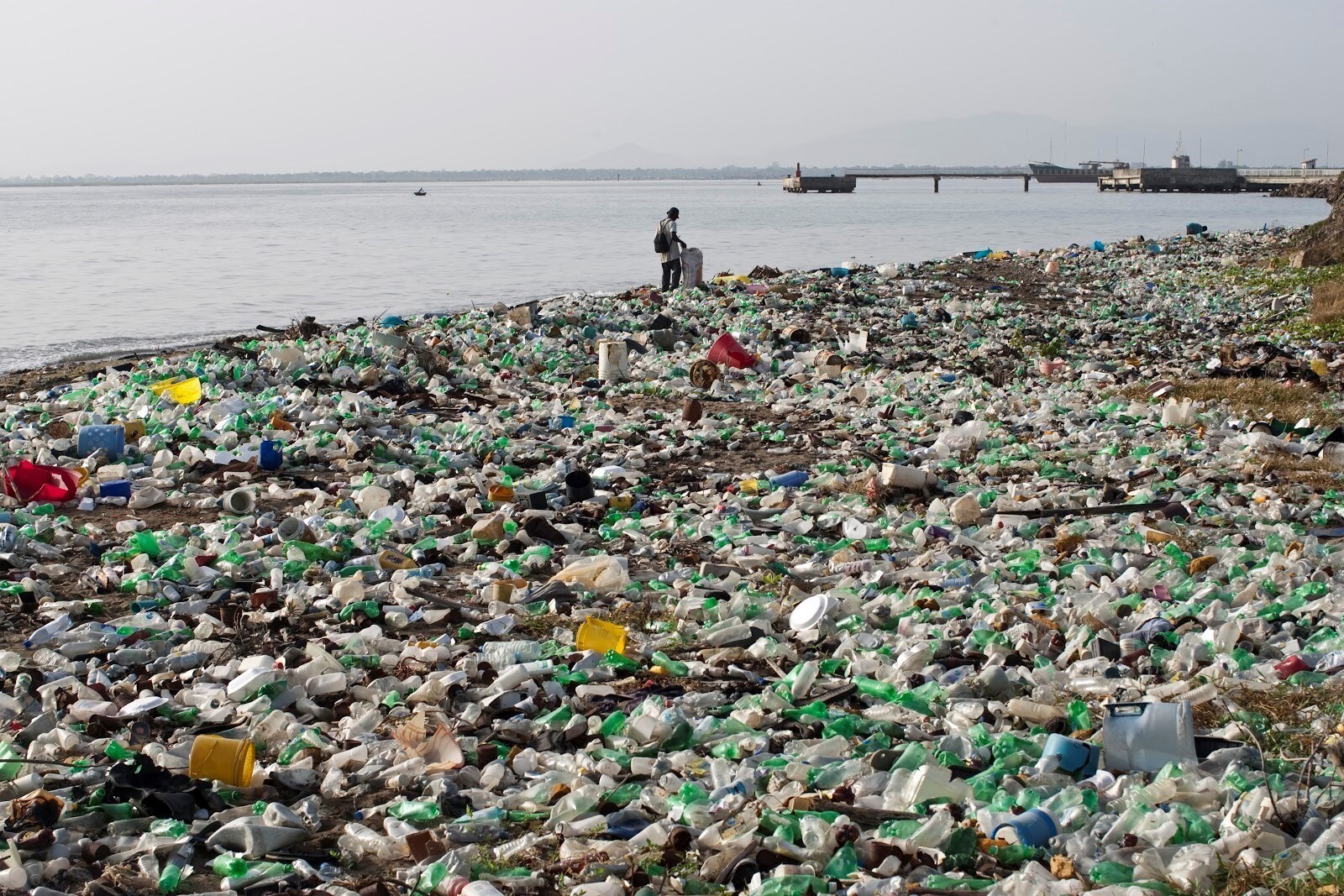 A beach covered in plastic waste.