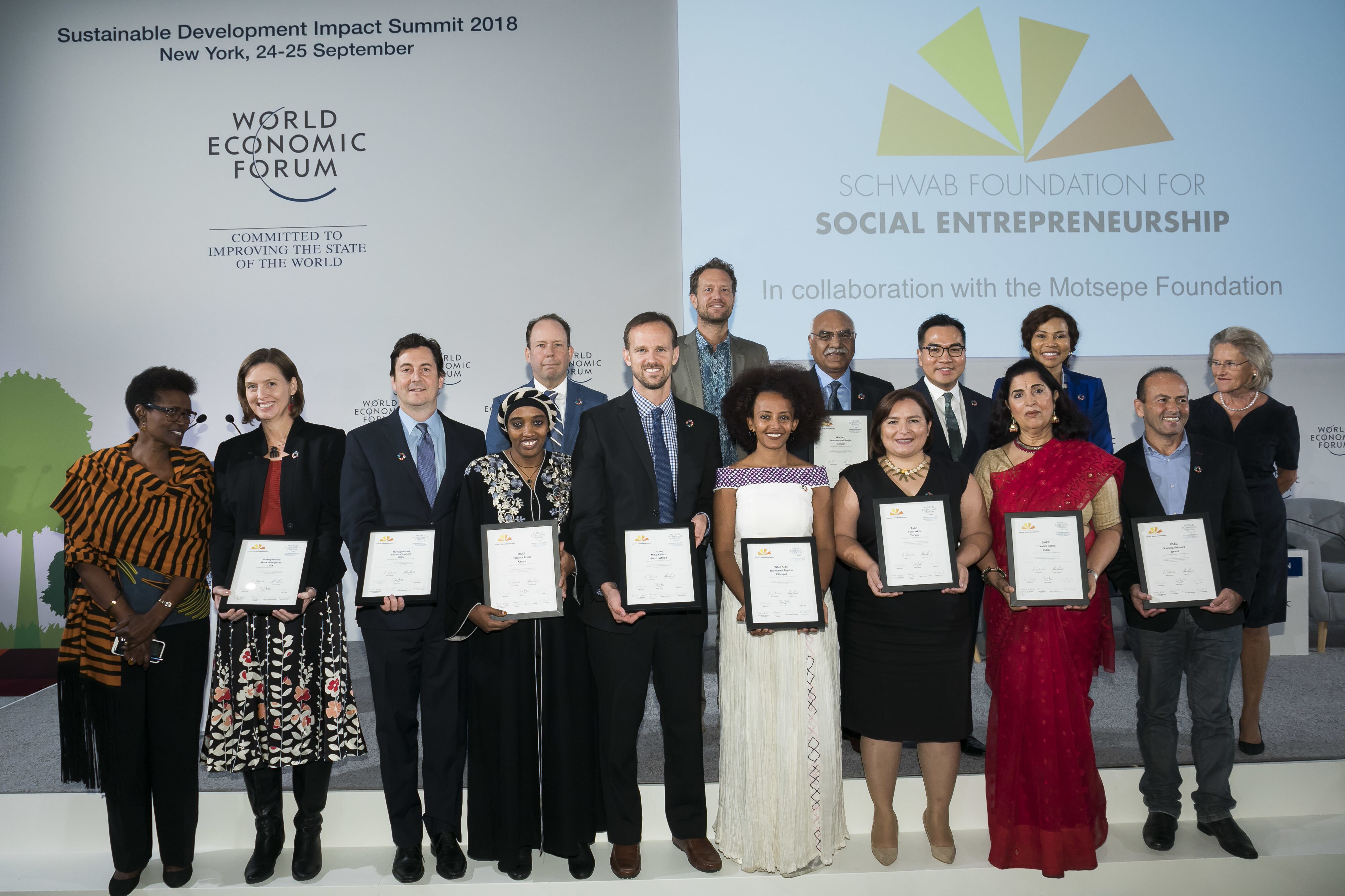 Hilde Schwab and attendees pose for photos at the Social Entrepreneur of the Year Award Ceremony at The World Economic Forum holds the Sustainable Development Impact Summit 2018 in New York, NY USA. Copyright by World Economic Forum / Ben Hider    
