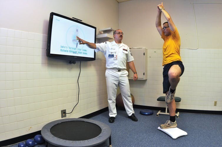 Thérapie avec yoga dans un hôpital militaire américain.