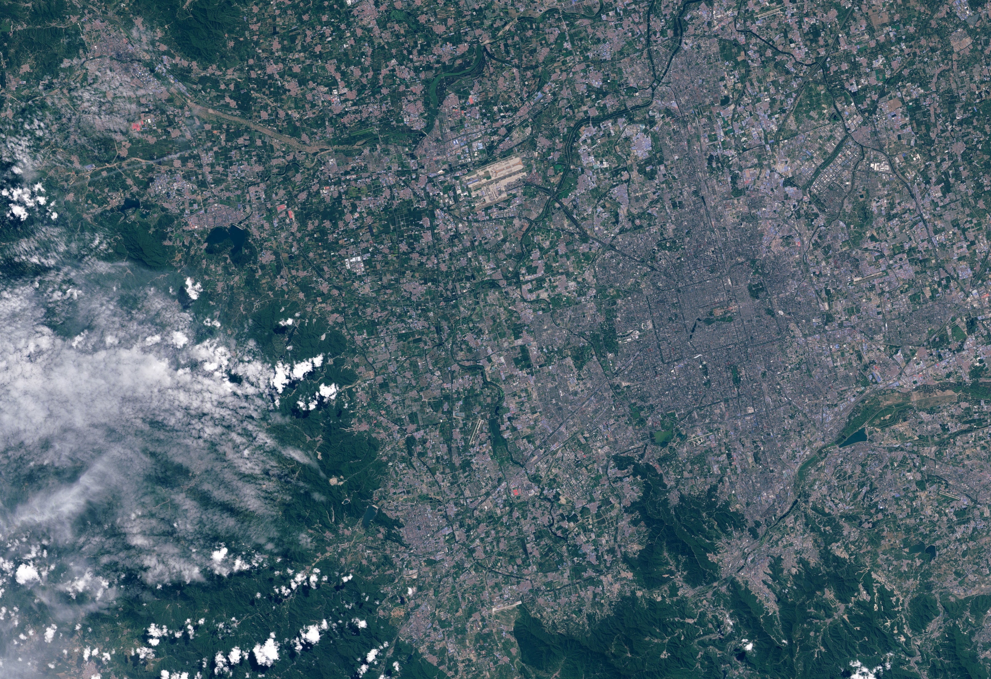 Beijing is seen in a NASA satellite image taken in 2015. Beijing, home to more than 21 million residents, is in the midst of launching itself into a mega-city where 110 million will live, served by new links to the port city of Tianjin and neighbouring Hebei province.      