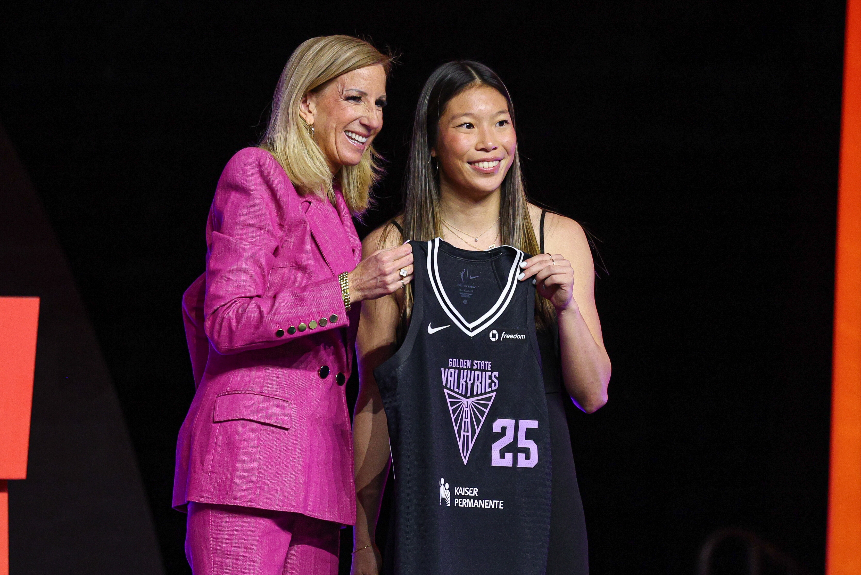 Apr 14, 2025; New York, New York, USA; Kaitlyn Chen poses with WNBA commissioner Cathy Engelbert after being selected with the number thirty overall pick to the Golden State Valkyries in the 2025 WNBA Draft at The Shed at Hudson Yards