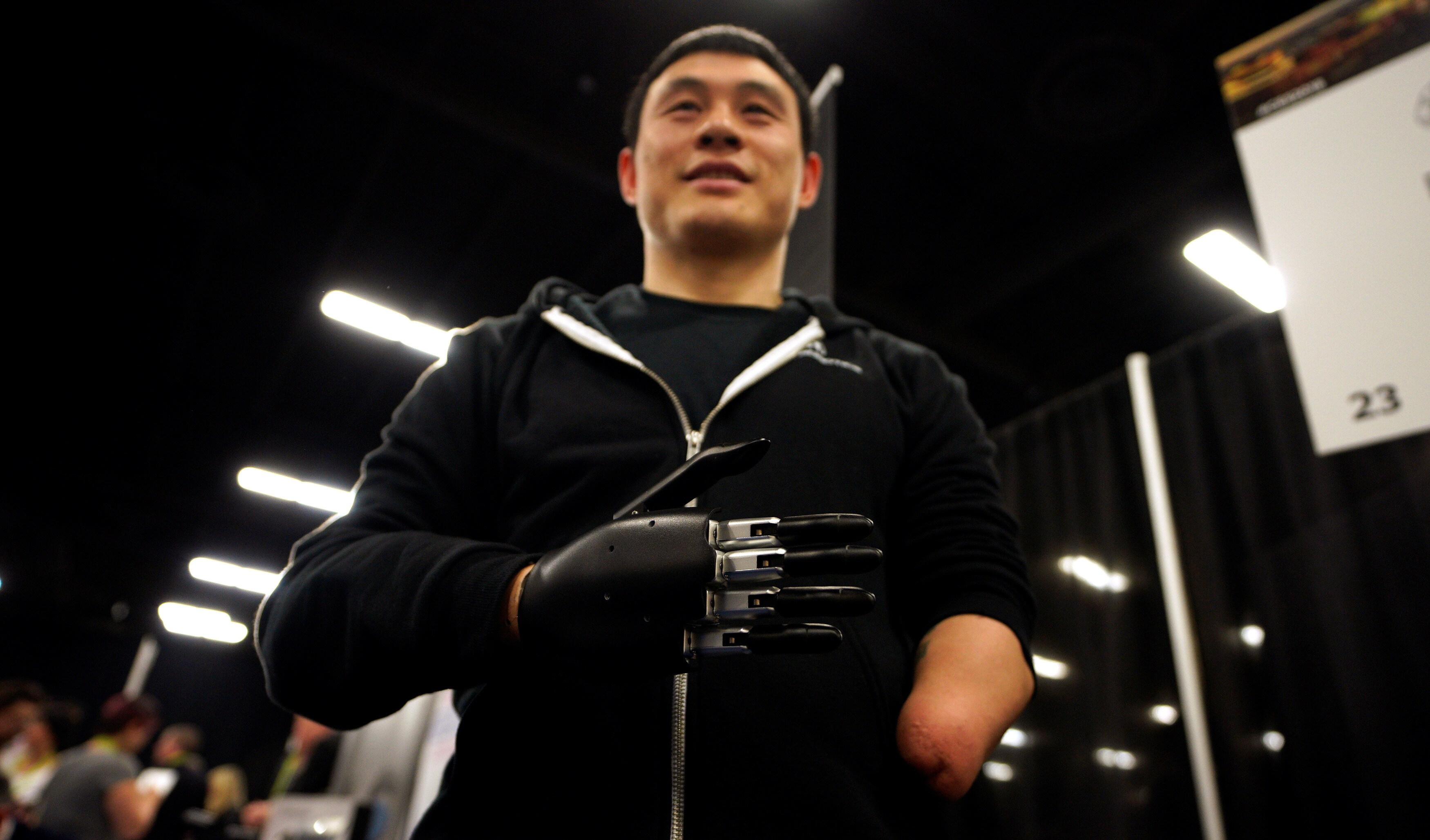 A user demonstrates an Brain Robotics AI-powered prosthetic hand.     