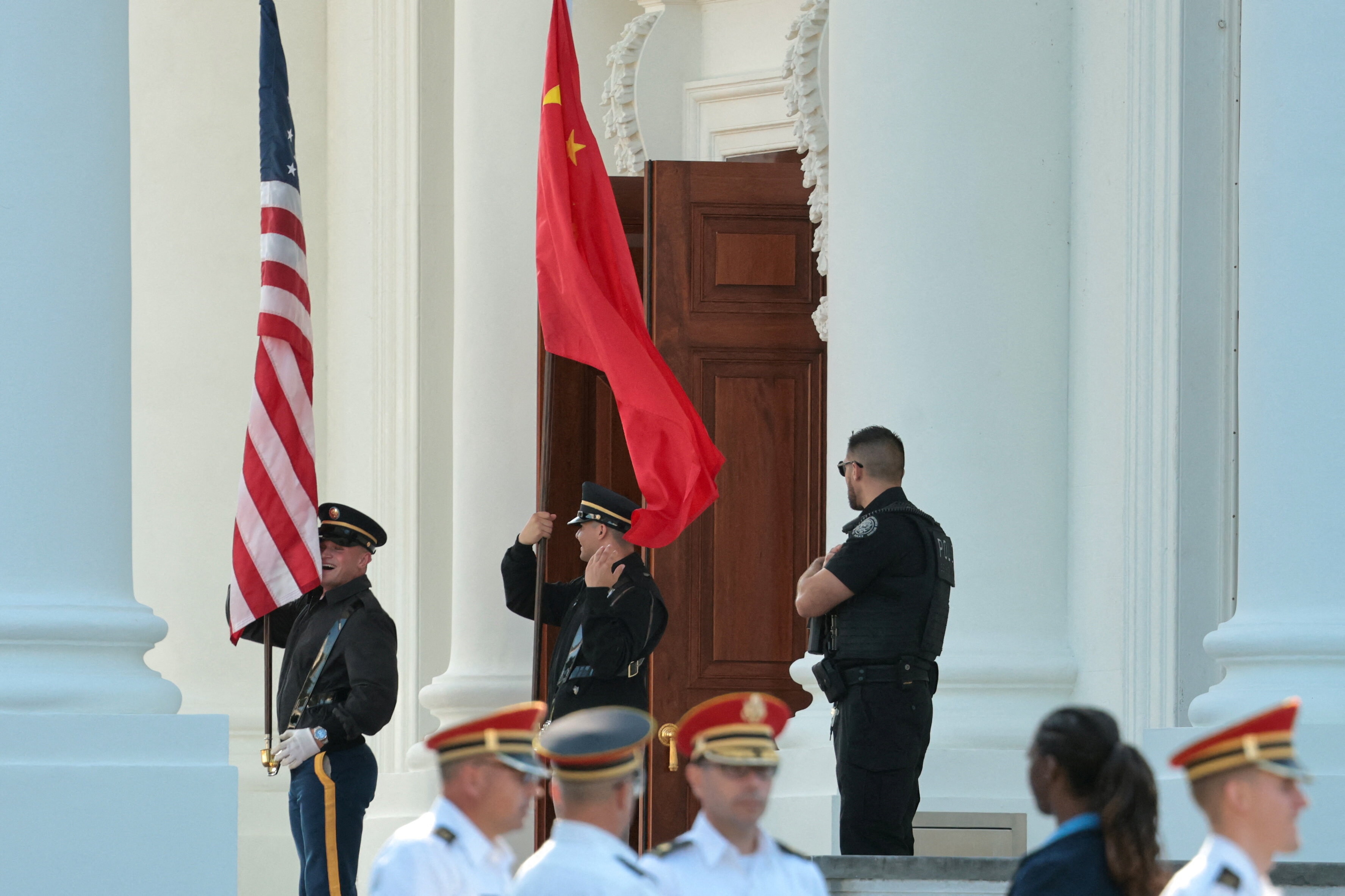 Members of a U.S. military honor guard rehearse an arrival ceremony with a Chinese flag and U.S. flag ahead of Chinese President Xi Jinpingâs state visit next week with U.S. President Donald Trump at the White House in Washington, D.C., U.S., September 16, 2026. REUTERS/Jonathan Ernst