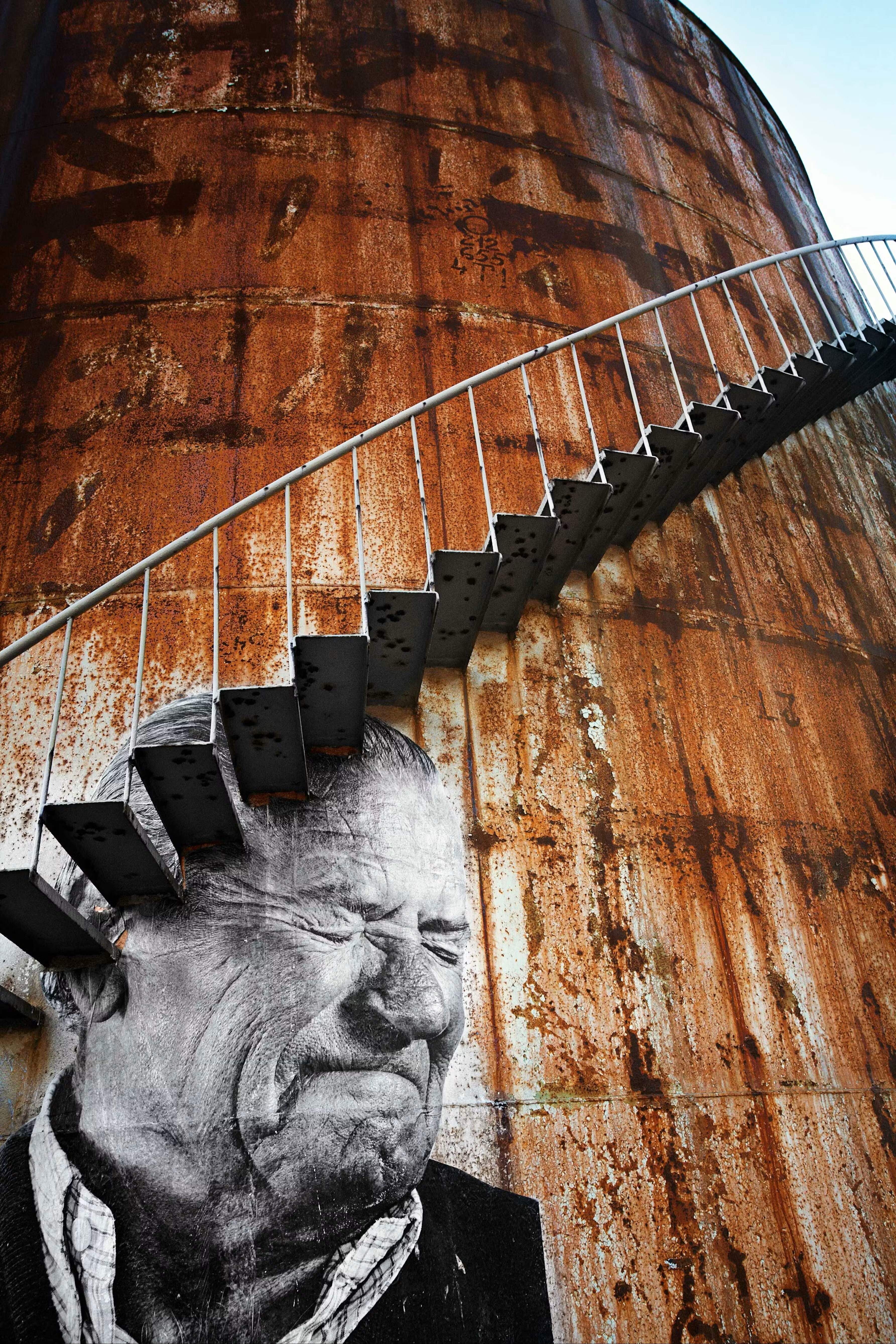 Wrinkles of the City by JR - Los Surcos de la Ciudad, Marino Saura Oton, Cartagena, Spain, 2008.