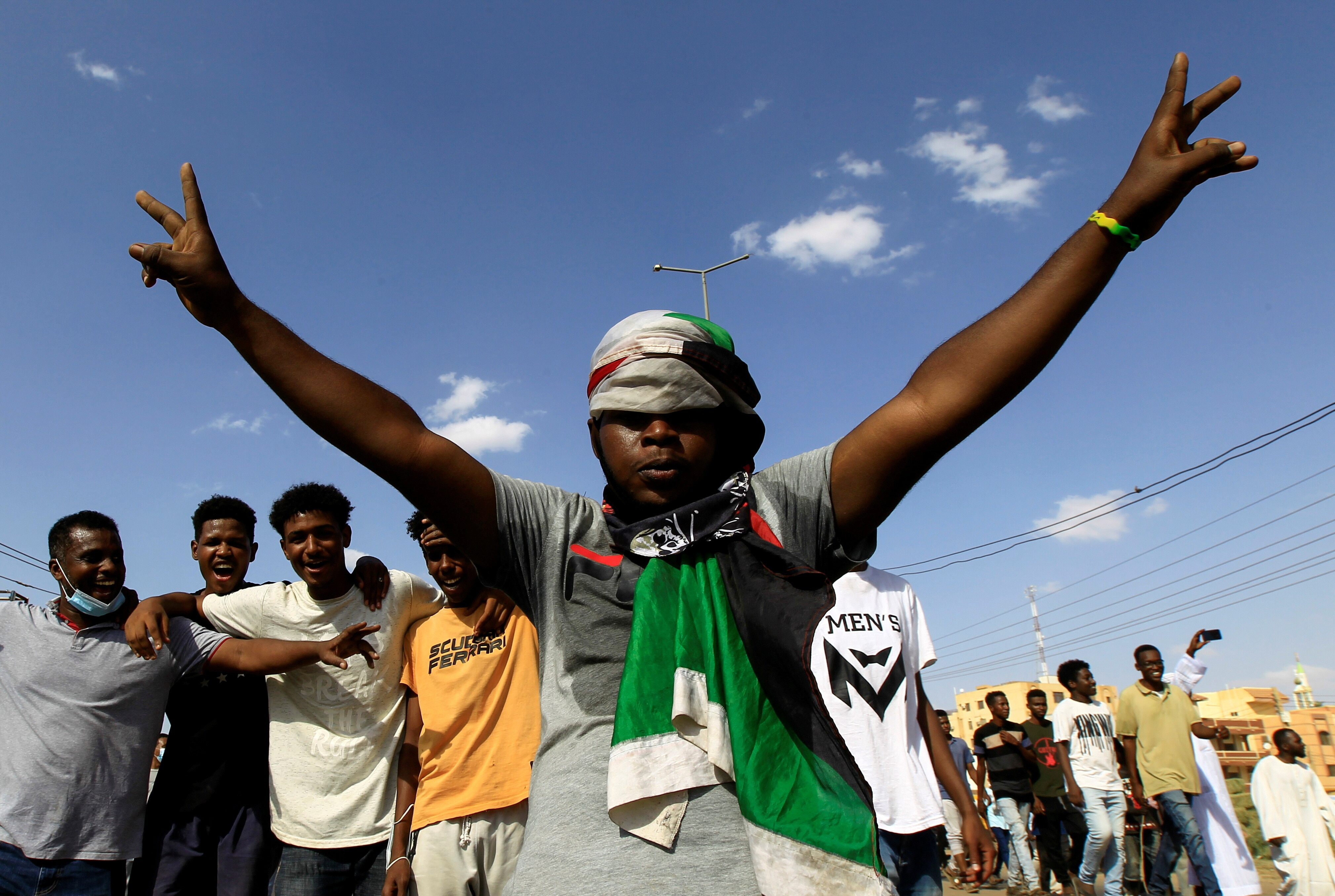 A protester gestures as people demonstrate against the Sudanese military's recent seizure of power and ousting of the civilian government, in the capital Khartoum, Sudan October 30, 2021