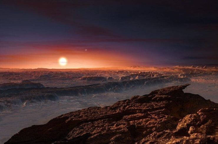 Les astronomes de l’Université Cornell disent que la vie sur Terre a déjà survécu à des radiations pires que celles sur Proxima-b. L’impression de cet artiste montre une vue de la surface de la planète Proxima b en orbite autour de l’étoile naine rouge Proxima Centauri, l’étoile la plus proche du système solaire