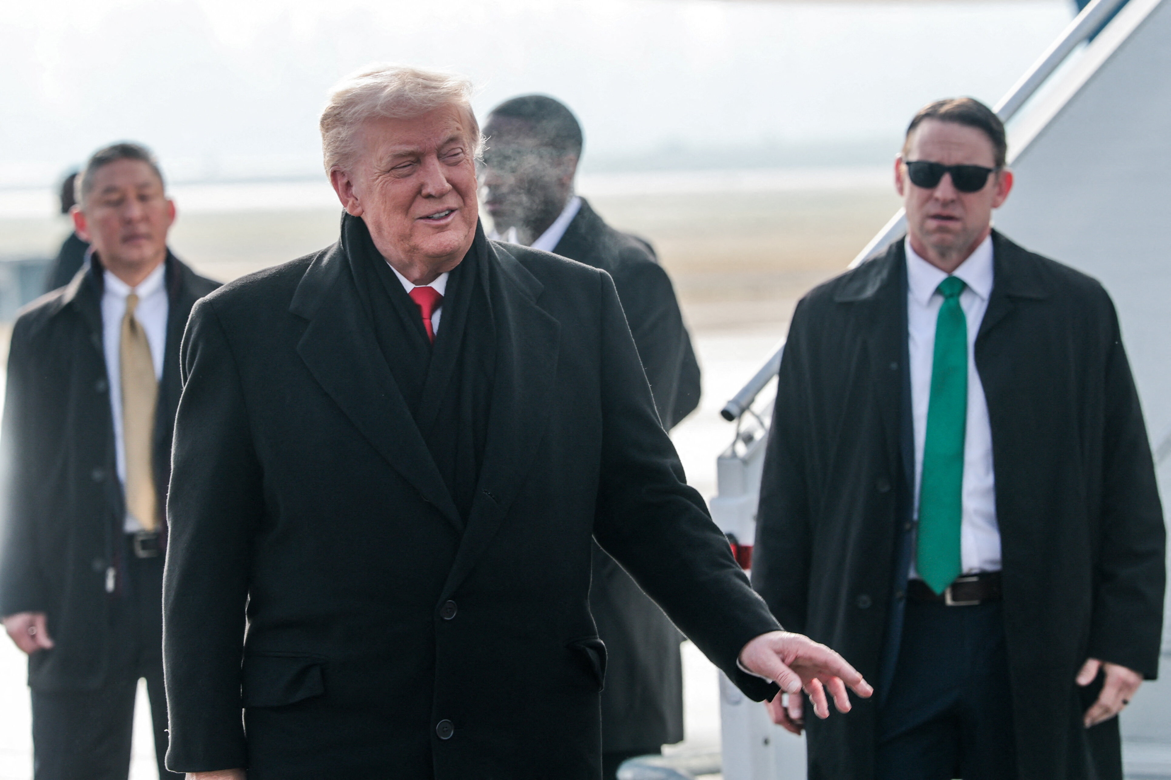 U.S. President Donald Trump after disembarking Air Force One en route to the World Economic Forum in Davos, at Zurich International Airport in Zurich, Switzerland January 21, 2026. REUTERS/Jonathan Ernst