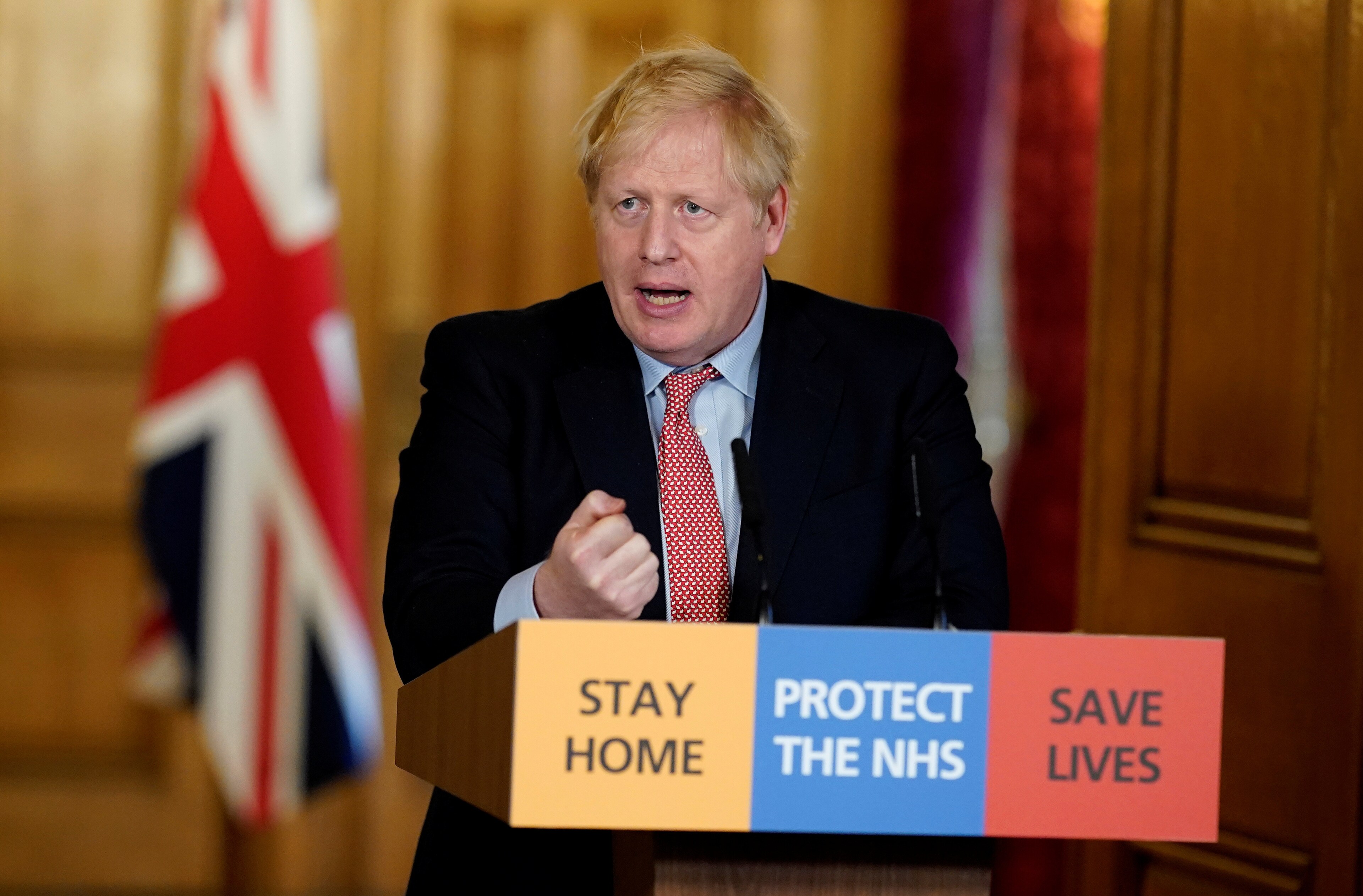 Britain's Prime Minister Boris Johnson speaks during his first remote news conference on the coronavirus disease (COVID-19) outbreak, in London, Britain March 25, 2020. Andrew Parsons/Pool via REUTERS - RC26RF96XSH8