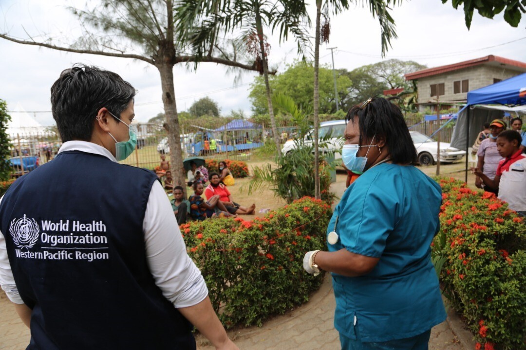 Two female healthcare workers in Papua New Guinea.