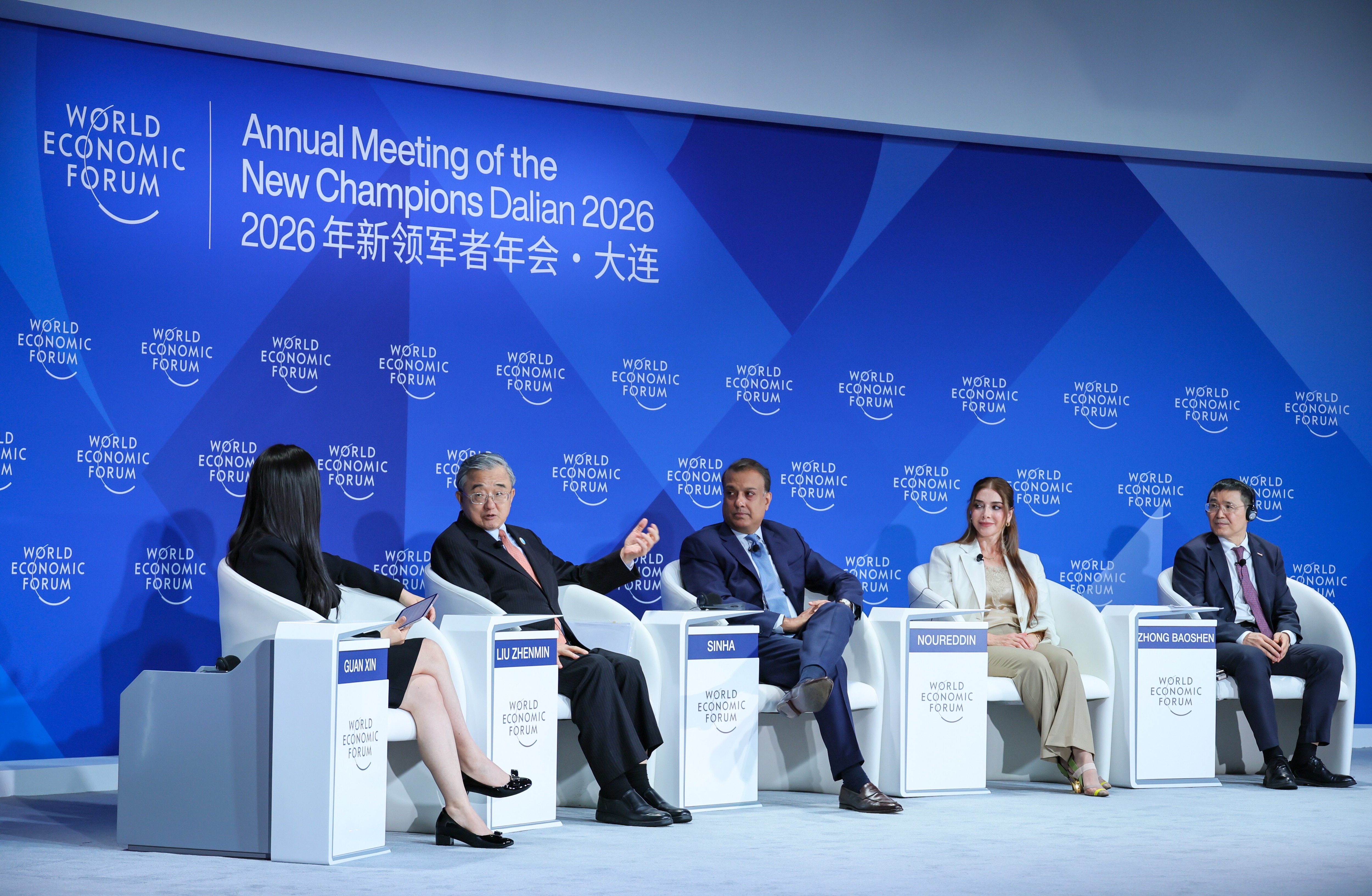 Follow the Money: Where Climate Capital Is Going session with Guan Xin, Anchor and Chief Business News Editor, China Global Television Network (CGTN), People's Republic of China; Lina Noureddin, President and Founder, Lamar Holding, Bahrain; Liu Zhenmin, Special Envoy for Climate Change of the People's Republic of China; Sumant Sinha, Chair and Chief Executive Officer, ReNew, India; Zhong Baoshen, Chairman, Longi Green Energy Technology Co., People's Republic of China during the Annual Meeting of the New Champions in Dalian, People's Republic of China, on 24/6/2026 from 13:00 to 14:00 in the Dalian International Conference Center - Studio (Zone C), Stakeholder Dialogue. (climate capital). Â©2026 World Economic Forum