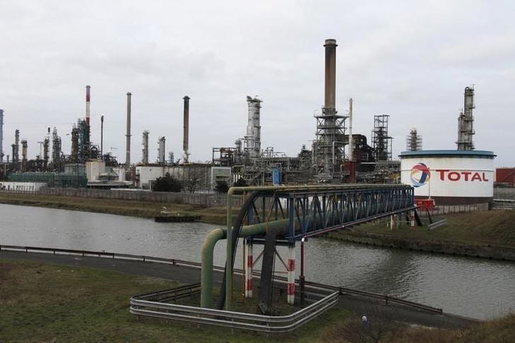 General view of the French oil giant Total refinery in Mardyck near Dunkerque on January 28, 2010. The 137,000 barrels-per-day Dunkirk plant has been shut for an unspecified duration since September 15, 2009 due to poor demand and margins. An extraordinary meeting with the central workers' body will be held on February 1 to discuss the refinery's future, union officials have said. The banners reads     